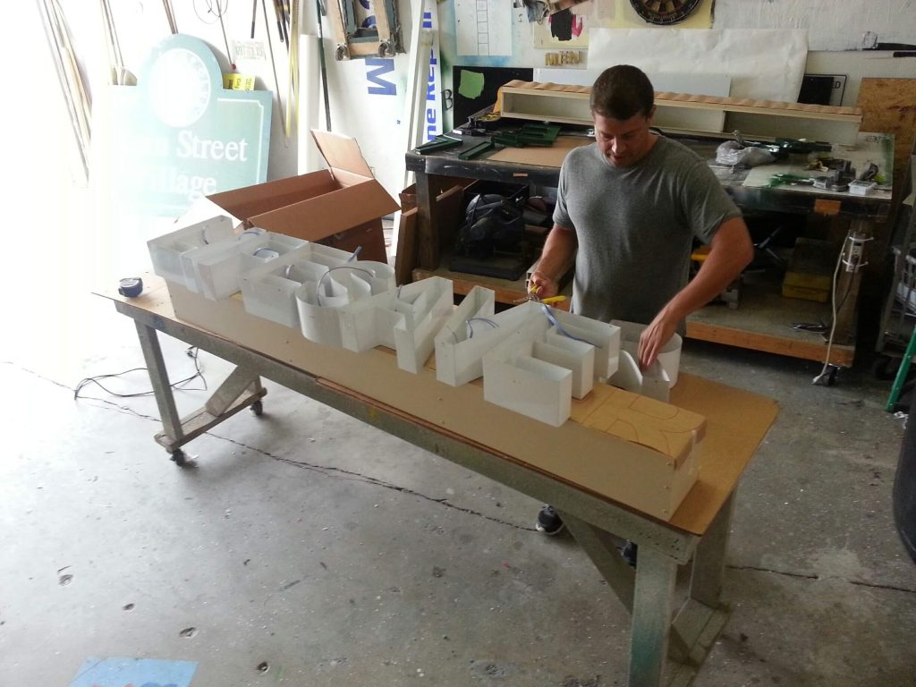 Signs Port St Lucie businesses use to stand out, including storefront signs, banners, and custom graphics created by Design a Sign.